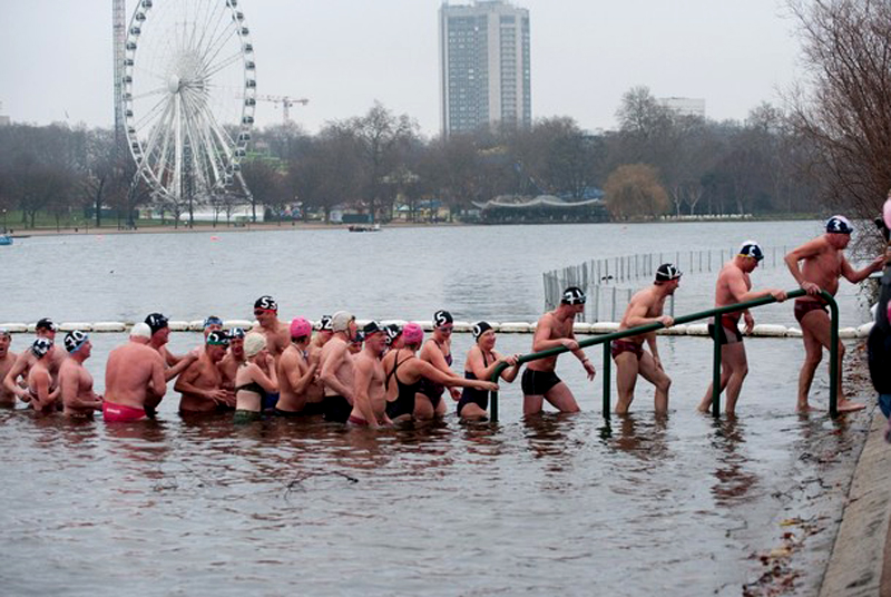 Swimmers Compete For The Peter Pan Cup In The Icy Waters Of The Serpentine